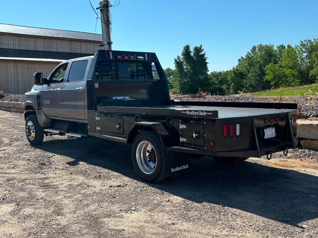 Aftermarket pickup flatbed from Bradford Built installed on a truck.