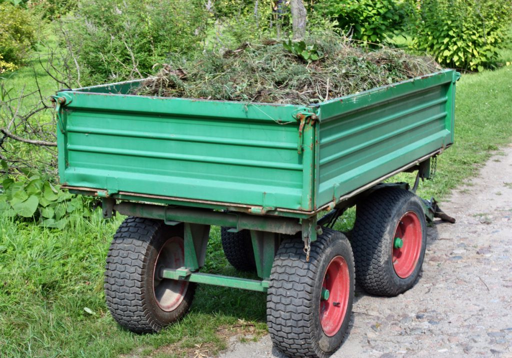 trailer tires - Cleaning trailer with lawn weeds