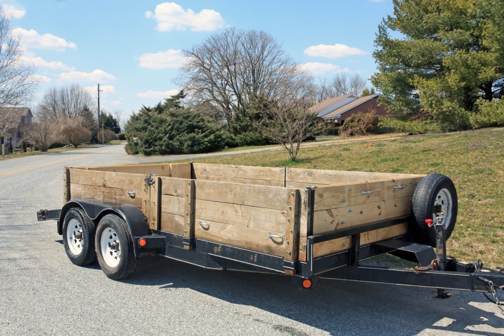 trailer tires - A trailer used to haul construction materials or a car when the sides are down. It was used in an Amish business and pulled by a pick up truck.