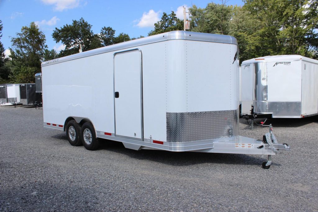 White Featherlite enclosed trailers.