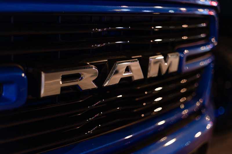 A closeup on a RAM truck grille. RAM makes some of the best pickup trucks for work. 
