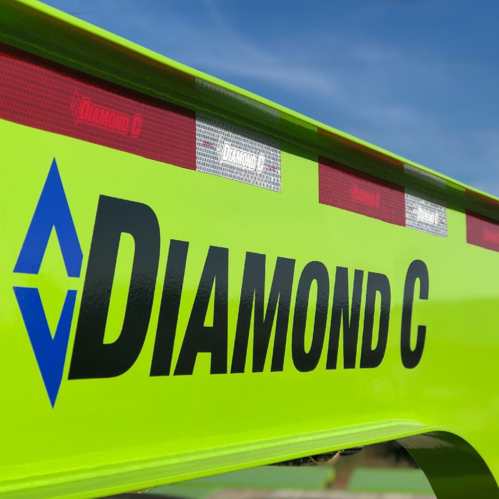 Closeup of Diamond C name on a green trailer. 